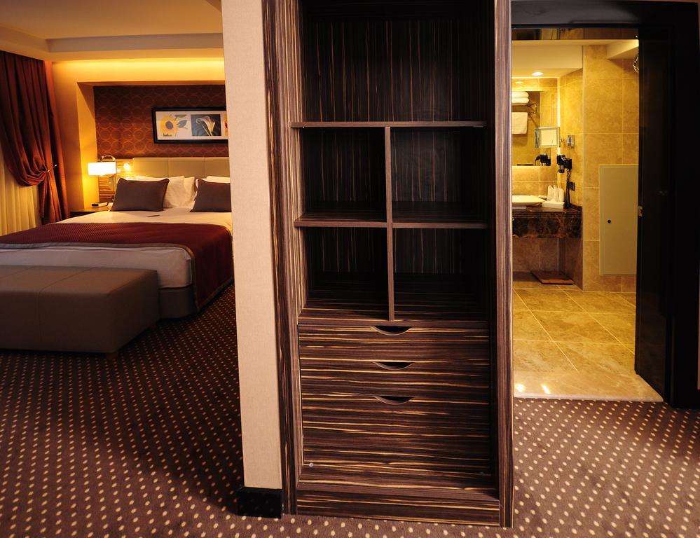 Отель Ramada Plaza By Wyndham Izmit Коджаэли Экстерьер фото A room at the hotel